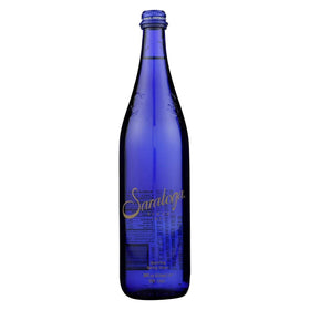 Saratoga Sparkling Spring Water bottle pouring into a glass for convenient, crisp hydration.