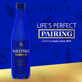 Saratoga Sparkling Water being poured into a glass, pairing well with meals.