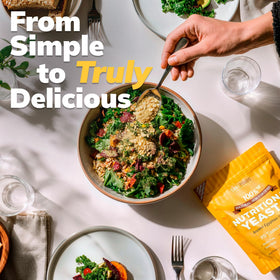 Sari Foods Co Non Fortified Nutritional Yeast Flakes dusted over pasta for a cheesy, nutty vegan finish.
