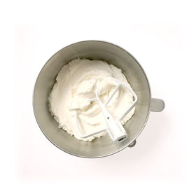Satin Ice Buttercream Mix whipped to creamy texture ideal for cake decorating.
