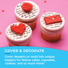 Satin Ice fondant used to mold decorative toppers and shapes.