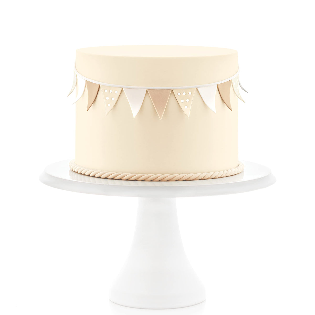 Satin Ice Ivory fondant used for cupcake decor with precision.