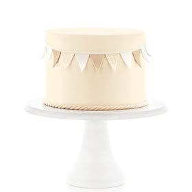 Satin Ice Ivory fondant used for cupcake decor with precision.