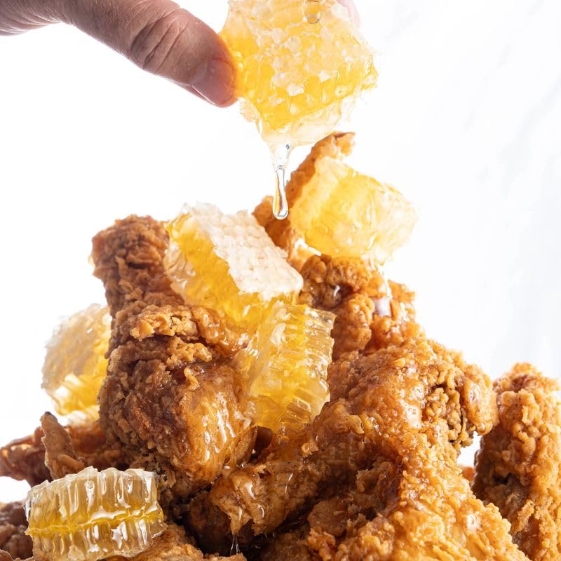 Savannah Bee Company Acacia honeycomb jar ready for drizzle and sharing.