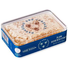 Savannah Bee Company Acacia honeycomb slice ideal for snacking on warm bread.