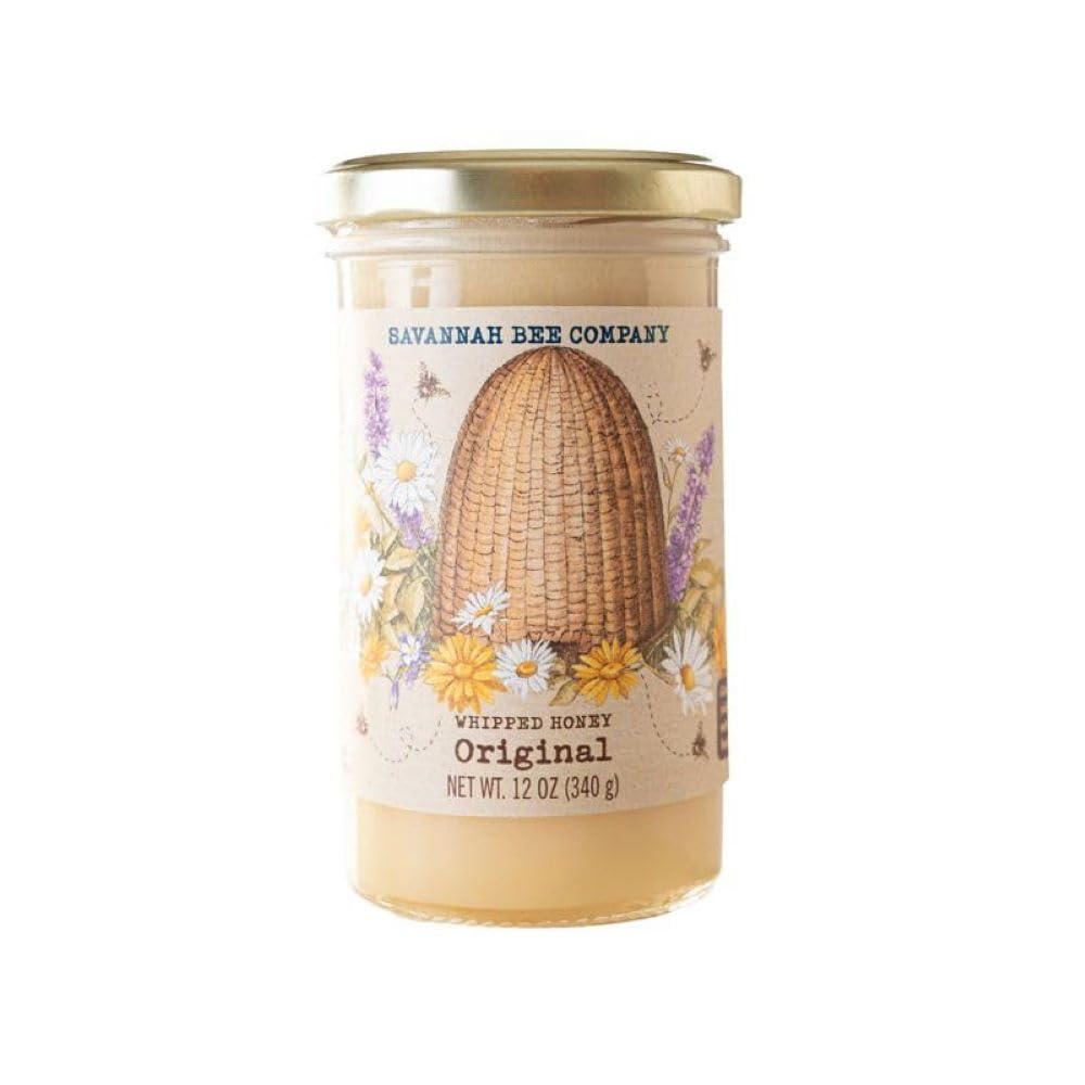 Savannah Bee whipped honey in an open jar, ideal for spreading on toast.