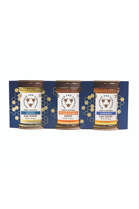 Savannah Bee honey sample set jar on wood board ideal for tasting and gifting.