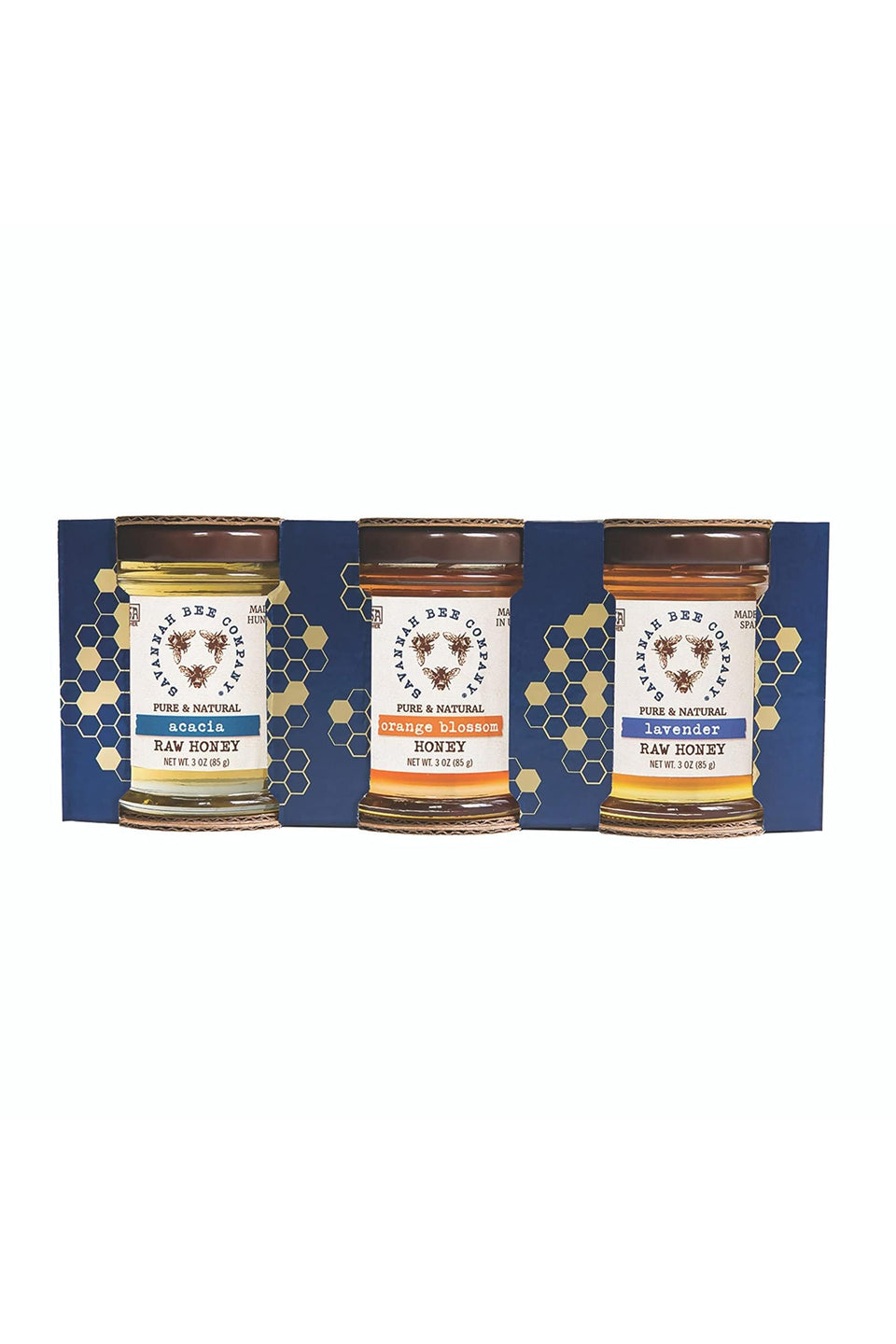 Savannah Bee honey sample set jar on wood board ideal for tasting and gifting.