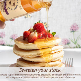 Savannah Bee Tupelo Honey spoon-dip highlights smooth texture ideal for toast or tea.