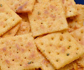 Stacked Savory Saltine Seasoning four-pack keeps pantry ready for gatherings.