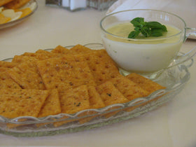 Kitchen counter scene with Savory Saltine Seasoning ready for entertaining.