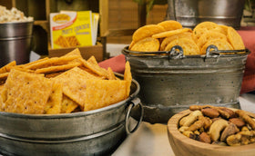 Party snacks setup featuring Savory Saltine Seasoning for flavorful bites.