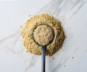 Savory Spice Four Mushroom Umami Blend jar closeup highlights fine powder for quick umami boost.