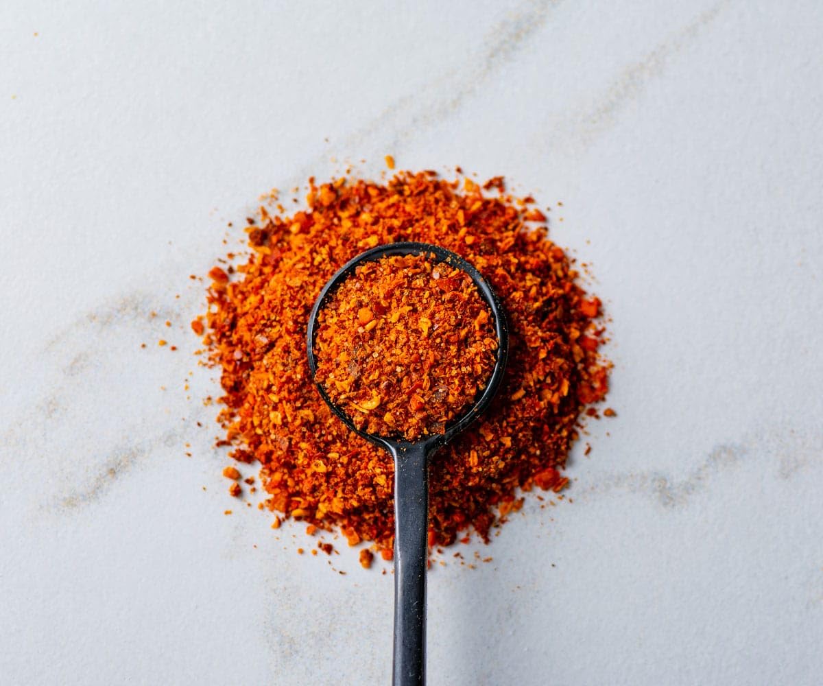 Savory Spice Merquen bottle pour; easy flavor drizzle for meals.