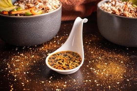 Savory Spice Shichimi Togarashi spice blend on kitchen shelf for noodles.