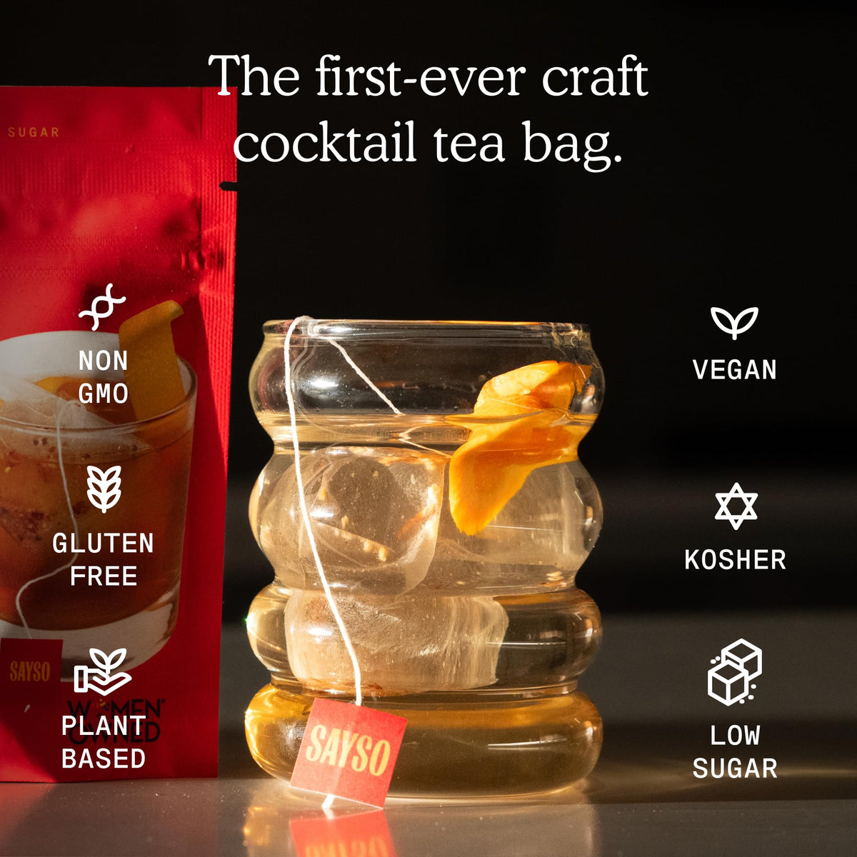 SaySO Old Fashioned tea bag closeup highlights dried fruits and herbs.