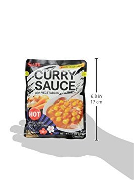 S&B curry sauce with vegetable chunks featuring carrot, potato, and onion.