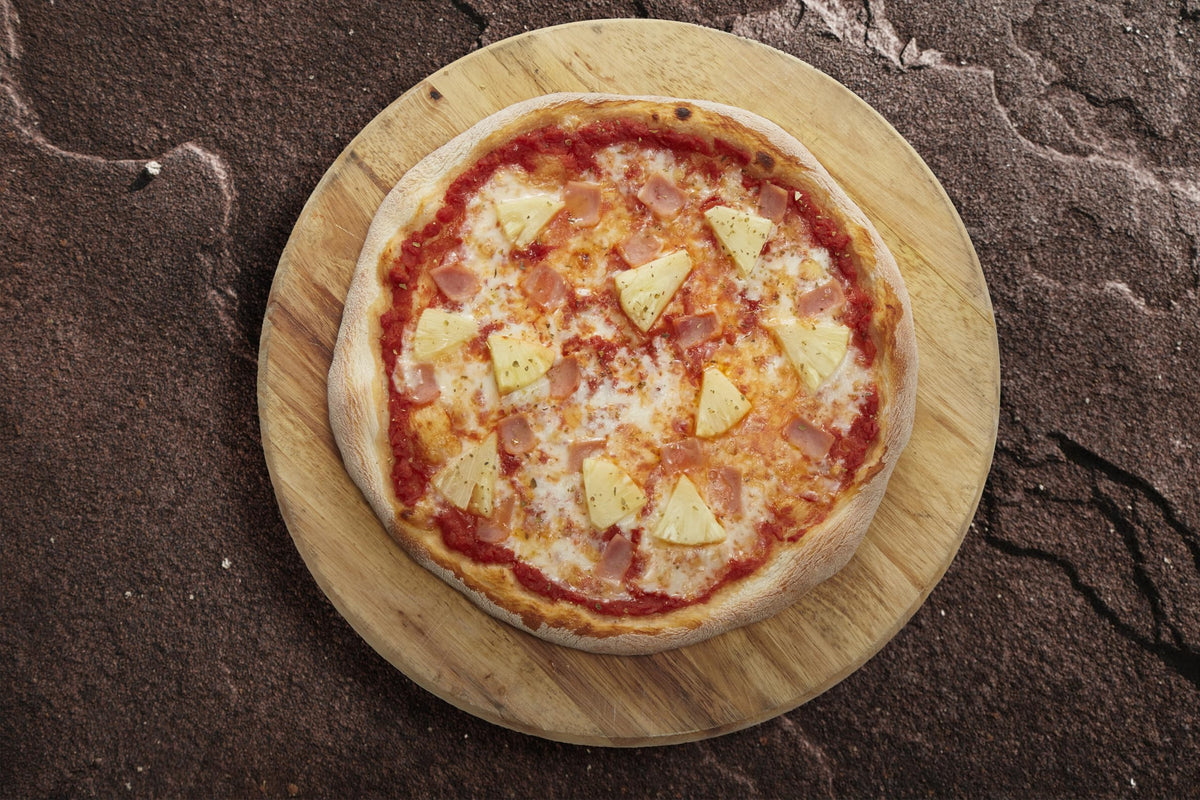 Schär gluten-free crust topped with veggies for a quick meal.