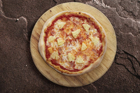 Schär gluten-free crust topped with veggies for a quick meal.