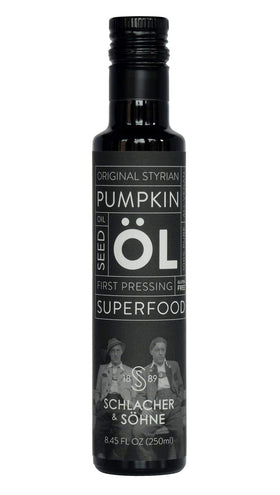 A bottle of Schlacher & Söhne Styrian Pumpkin Seed Oil ideal for dressings and sauces.