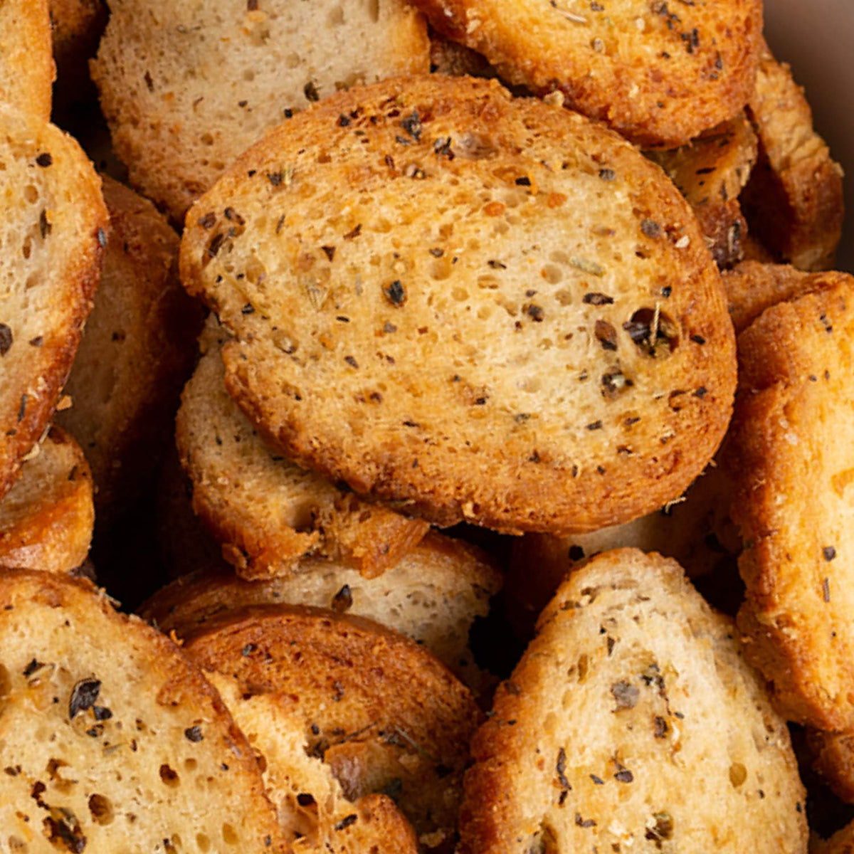 Artisan-baked Schwartz Brothers chips show garlic and herb specks.