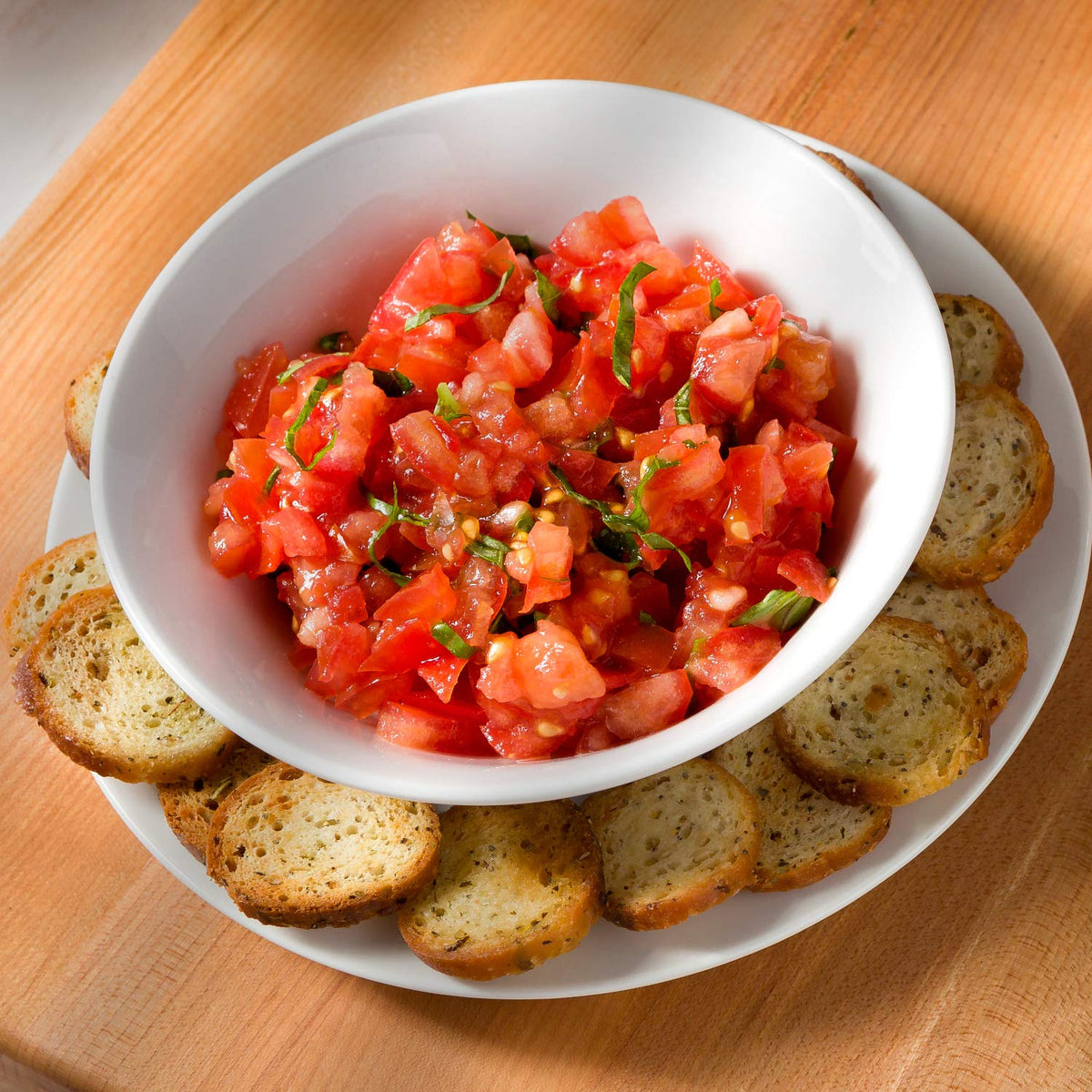 Schwartz Brothers Garlic and Herb Bagel Chips in a bowl ready for sharing.