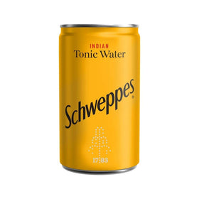 Schweppes Indian Tonic Water with glass and ice ideal mixer for refreshing drinks