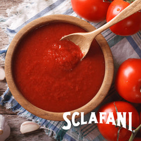 Sclafani crushed tomatoes pouring demonstrates easy can-to-pan access for sauces