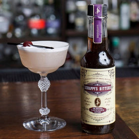Scrappy's Lavender bottle close-up emphasizes small-batch craftsmanship and natural hues.