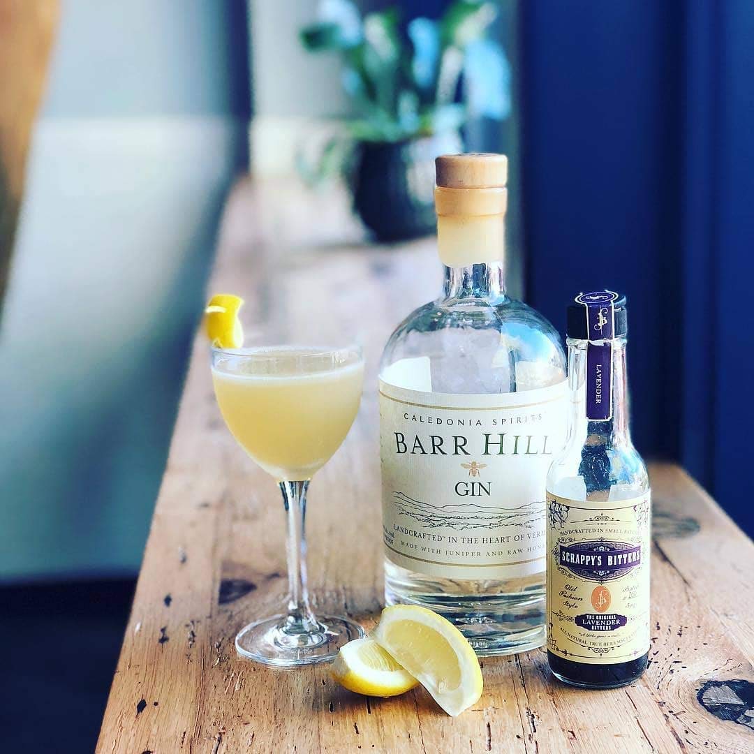 Scrappy's Lavender bottle beside a glass showcases precise blending and versatility.