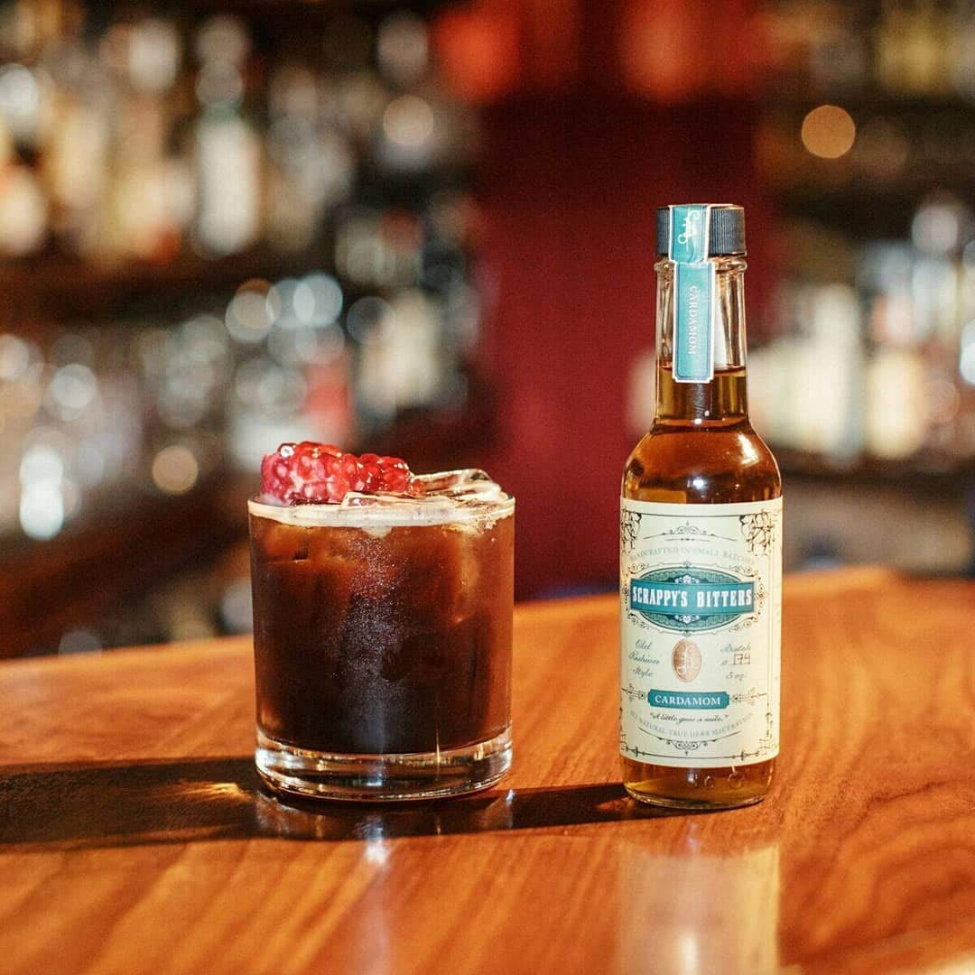 Scrappy's Cardamom Bitters pour glass shows a bold aroma elevating rum punches.