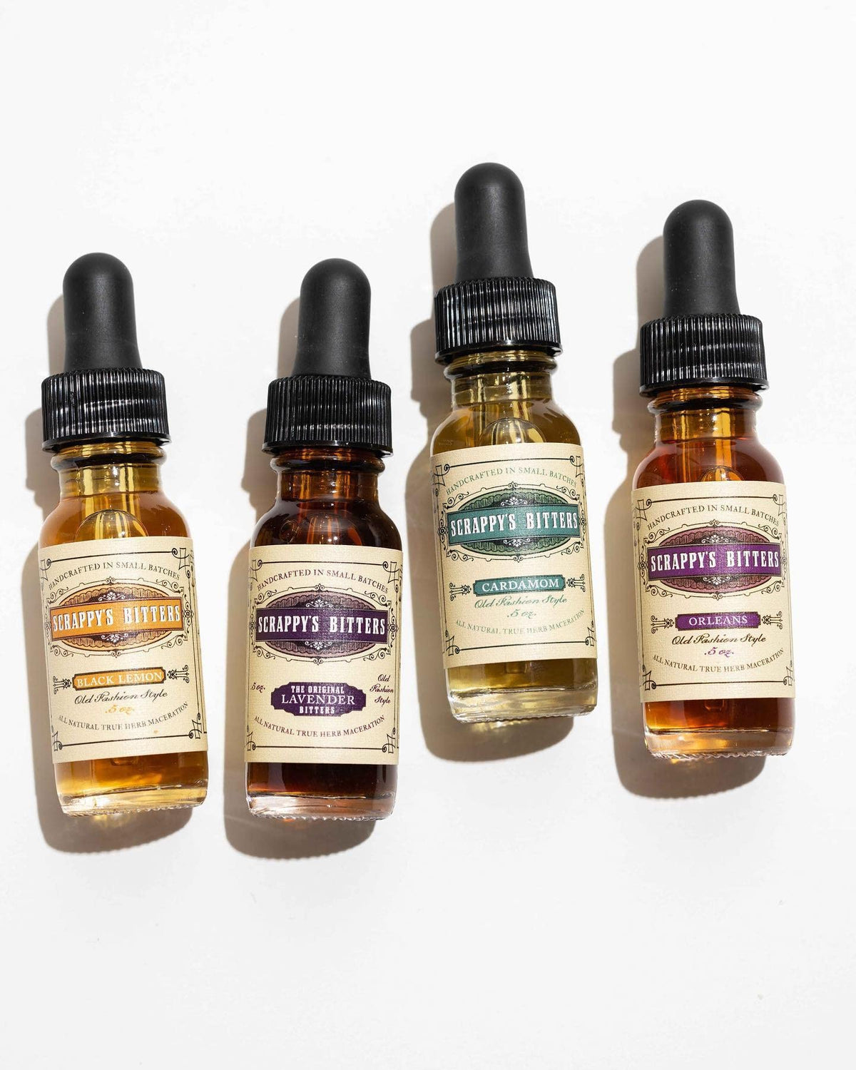 Scrappy's Cardamom bitters bottle close-up, introduces warm spice