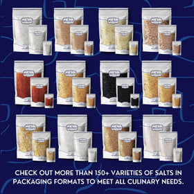 Sea Salt Superstore black truffle salt over roasted vegetables for aroma.