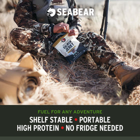 SeaBear cold-smoked salmon jerky close-up shows rich texture and shine.