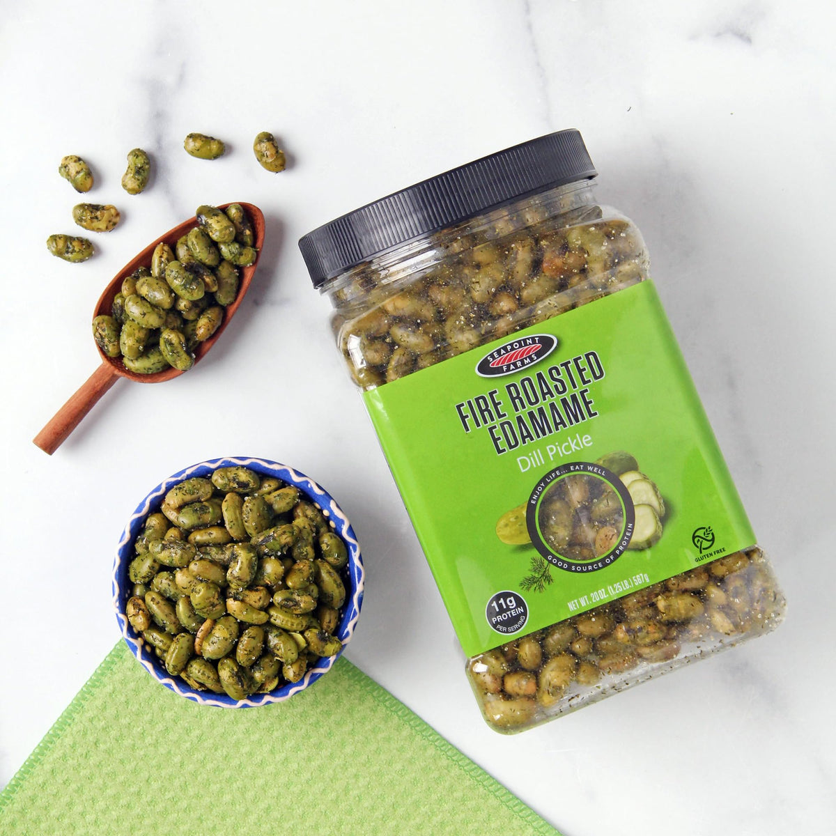 Seapoint Farms dill pickle edamame used as salad topping or snack.