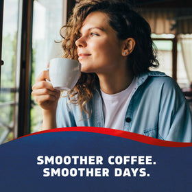 Ground coffee bag with mug highlighting Seattle's Best Breakfast Blend aroma.
