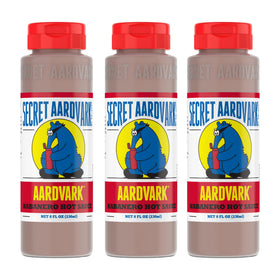 Secret Aardvark Habanero Hot Sauce bottle with pour spout showcases bold flavor for grilling and marinades.