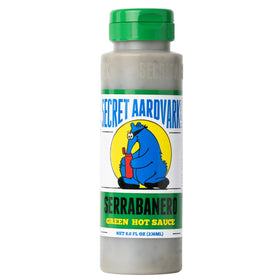 Secret Aardvark Serrabanero bottle front with bold green heat for tacos.
