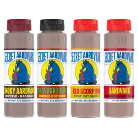 Secret Aardvark Smoky Chipotle bottle enhances grilled meats with smoky depth.