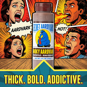 Secret Aardvark Smoky Chipotle Hot Sauce beside tacos suggests versatile finishing touch.