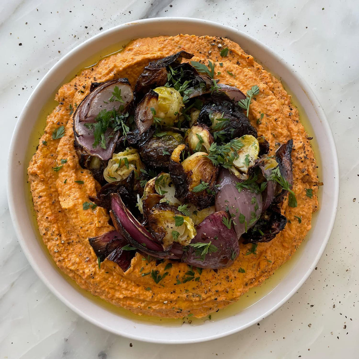 Seed + Mill tahini on pita with vegetables
