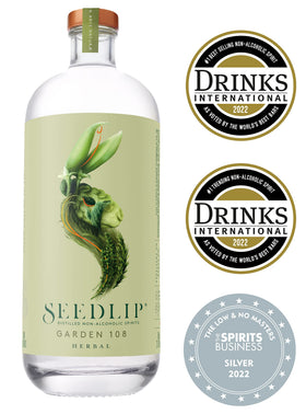 Seedlip Garden 108 botanicals display natural ingredients like peas, thyme, and rosemary