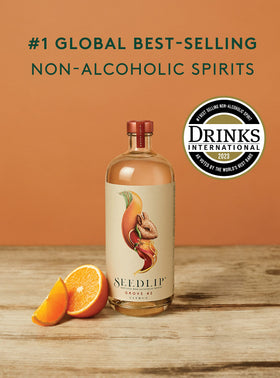 Seedlip Grove 42 pour into a glass, ideal for craft mocktails at home.