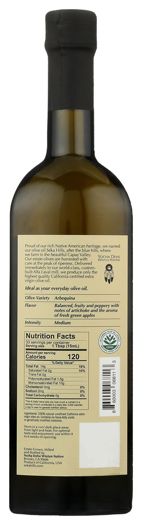 Close-up of the Arbequina label showing origin and harvest details