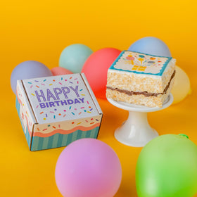 Send A Cake happy birthday gift box front shows gift-ready packaging for celebrations.