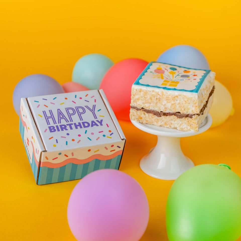 Send A Cake happy birthday gift box front shows gift-ready packaging for celebrations.