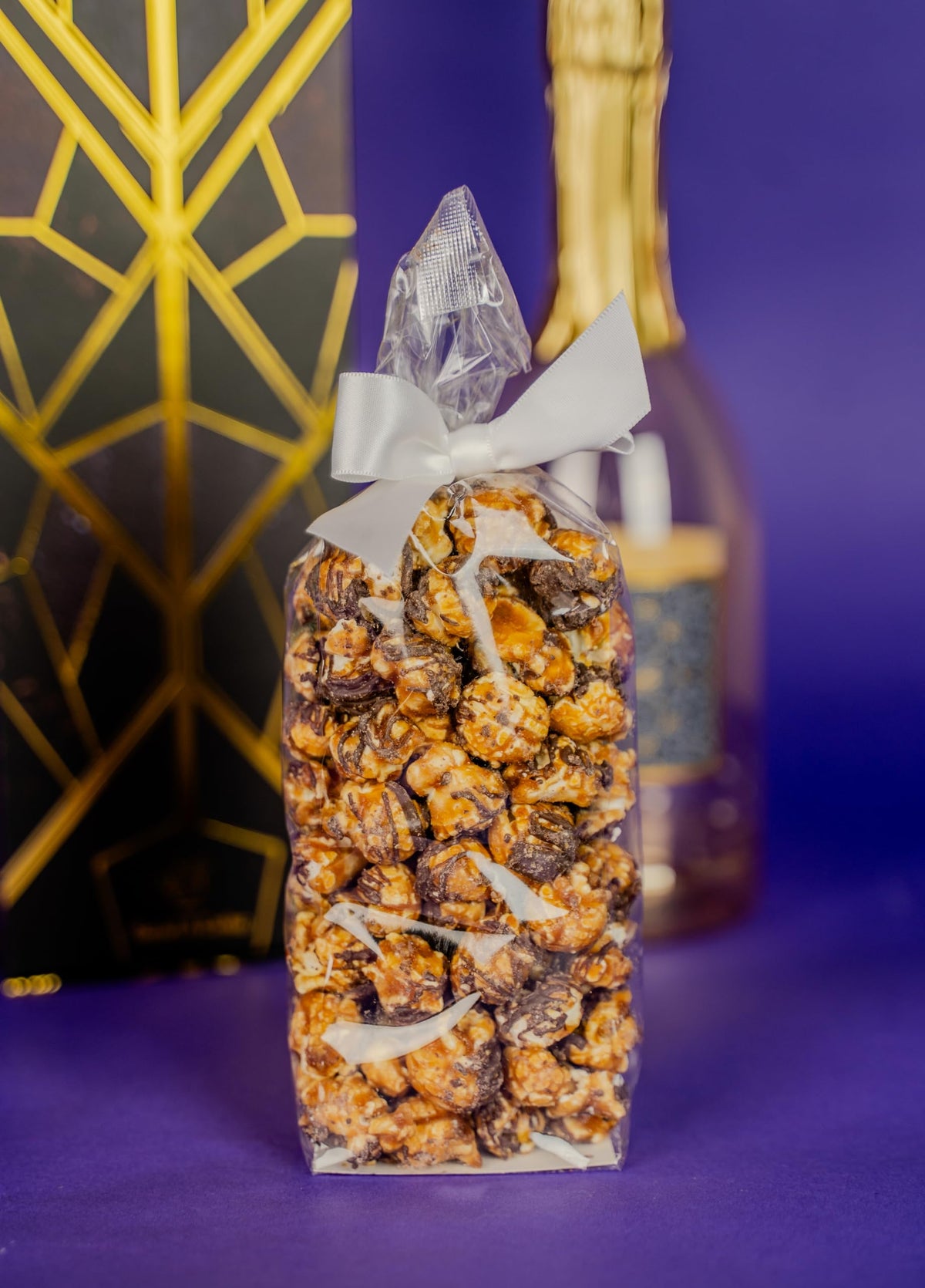 Send A Cake box detail with embossed texture adds luxe feel.