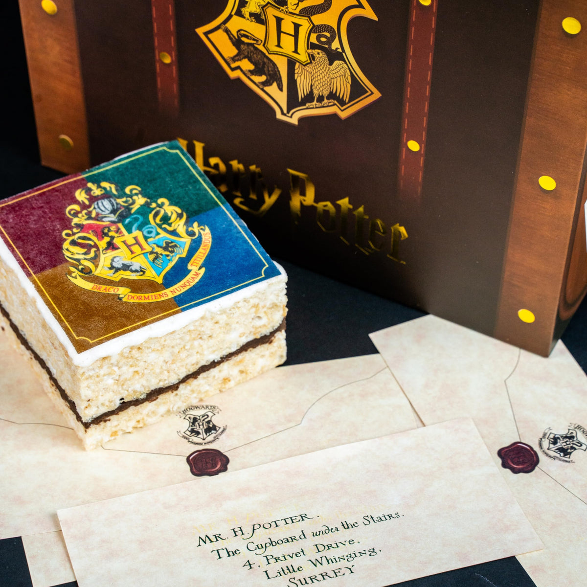Send A Cake Hogwarts-inspired music—enchanting melody during unboxing.