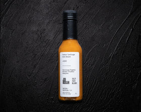 Senor Lechuga hot sauce bottle with reapers adds fiery complexity.