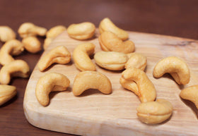 Close-up texture of Setton Farms roasted unsalted cashews showing natural crunch